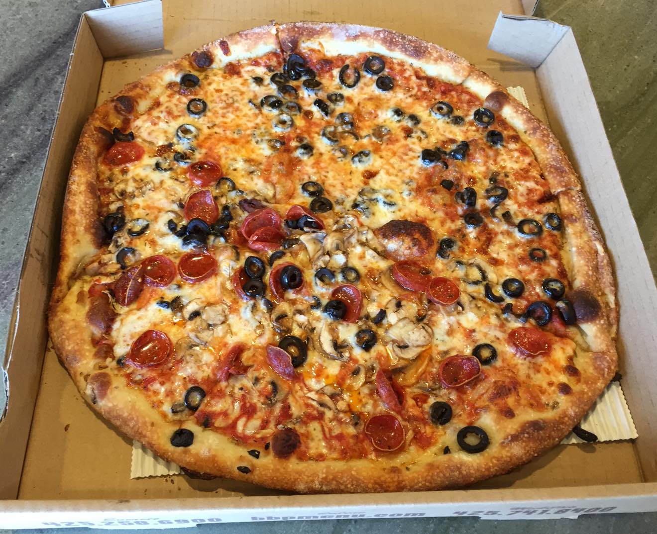 14 inch black olive, half pepperoni and mushroom.  Purchased and consumed April 12th, 2015
